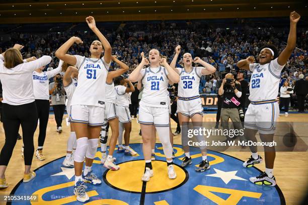 Lauren Betts, Lina Sontag, Angela Dugalic and Christeen Iwuala of the UCLA Bruins song the UCLA fight song after defeating the Creighton Bluejays...