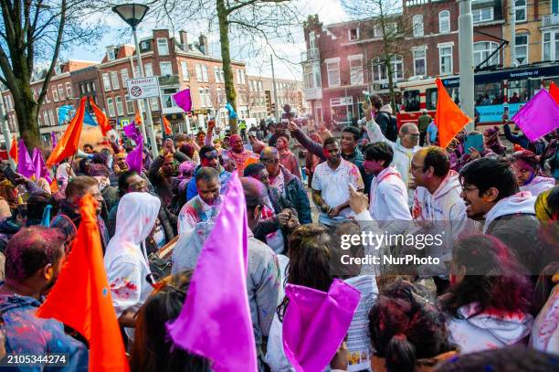 People are celebrating in the multicultural Transvaal neighborhood of The Hague, Netherlands, on March 25 where the largest Indian population in...