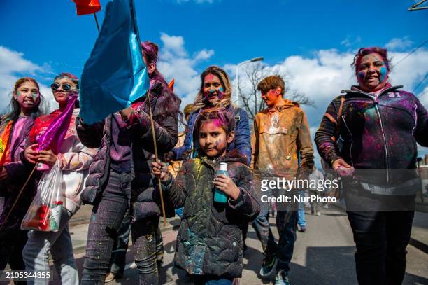 People are celebrating in the multicultural Transvaal neighborhood of The Hague, Netherlands, on March 25 where the largest Indian population in...