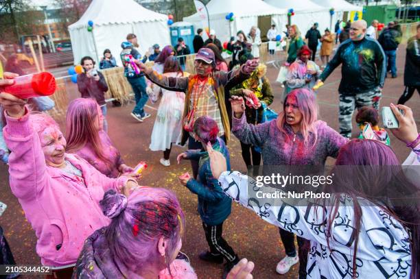 People are celebrating in the multicultural Transvaal neighborhood of The Hague, Netherlands, on March 25 where the largest Indian population in...