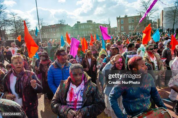 People are celebrating in the multicultural Transvaal neighborhood of The Hague, Netherlands, on March 25 where the largest Indian population in...