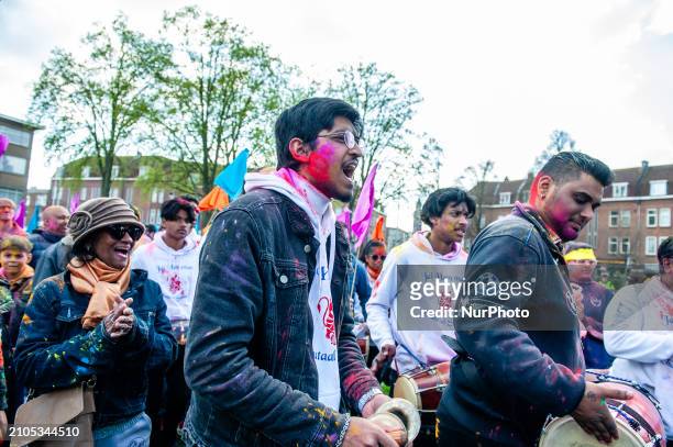 People are celebrating in the multicultural Transvaal neighborhood of The Hague, Netherlands, on March 25 where the largest Indian population in...