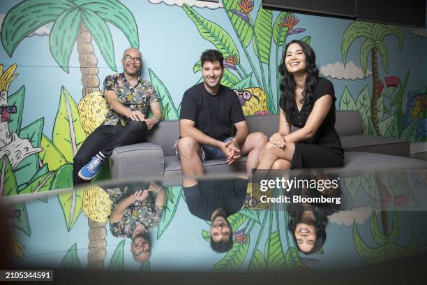 Melanie Perkins, chief executive officer of Canva Inc., right, Cliff Obrecht, chief operating officer, center, and Cameron Adams, chief product...