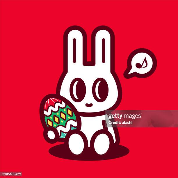 a cute bunny holding an easter egg, sits on the ground, looking to his left side - emotional support animal stock illustrations