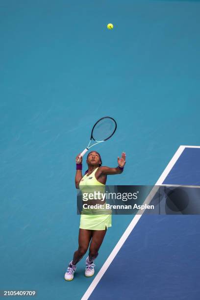 Coco Gauff of the United States hits a serve against Nadia Podoroska from Argentina during their match on day 7 of the Miami Open at Hard Rock...