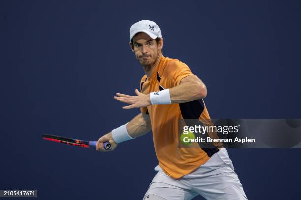 Andy Murray of the United Kingdom hits a shot against Tomás Martín Etcheverry of Argentina during their match on day 7 of the Miami Open at Hard Rock...