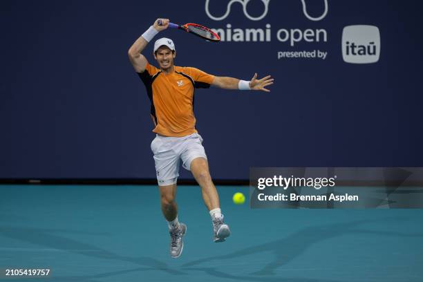 Andy Murray of the United Kingdom hits a shot against Tomás Martín Etcheverry of Argentina during their match on day 7 of the Miami Open at Hard Rock...