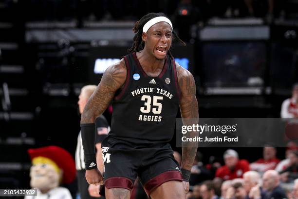 Manny Obaseki of the Texas A&M Aggies celebrates a basket against the Nebraska Cornhuskers in the first round of the NCAA Men's Basketball Tournament...