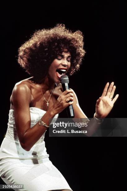 American singer and actress Whitney Houston performs on September 9, 1987 at Madison Square Garden in New York City, New York.