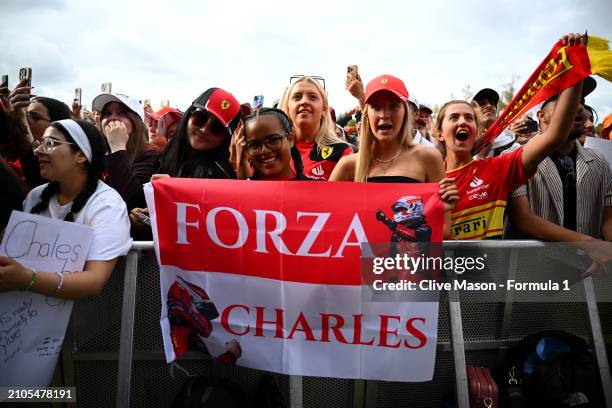 Charles Leclerc of Monaco and Ferrari fans show their support at the fan stage prior to final practice ahead of the F1 Grand Prix of Australia at...