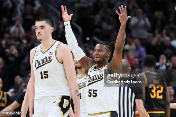 Lance Jones of the Purdue Boilermakers and Zach Edey of the Purdue Boilermakers celebrate during the game against the Grambling State Tigers during...