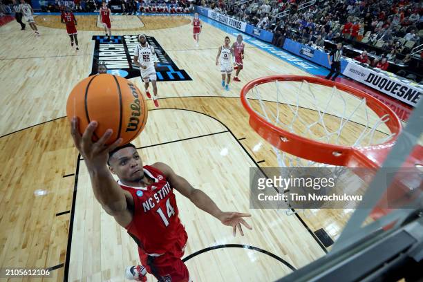 Casey Morsell of the North Carolina State Wolfpack shoots a lay up against the Texas Tech Red Raiders in the first round of the NCAA Men's Basketball...