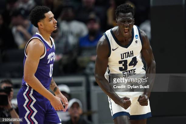 Kalifa Sakho of the Utah State Aggies reacts after a shot against the TCU Horned Frogs during the first half in the first round of the NCAA Men's...