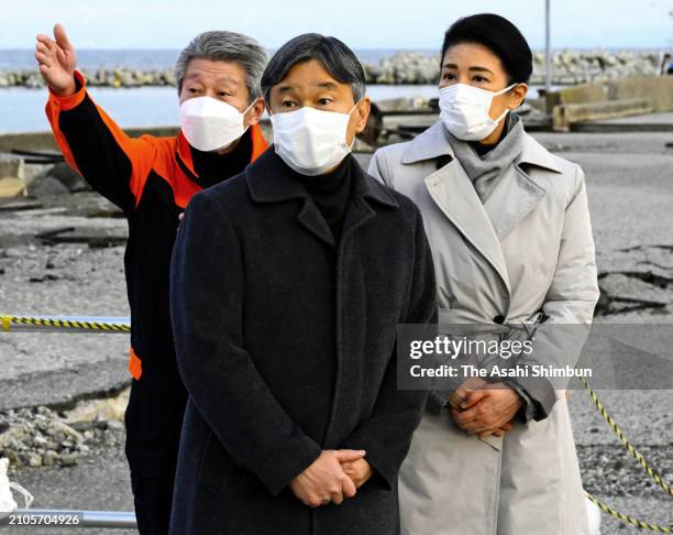 Emperor Naruhito and Empress Masako listen to explanation from Suzu City Mayor Masuhiro Izumiya at Iida Port after the Noto Peninsula Earthquakes on...