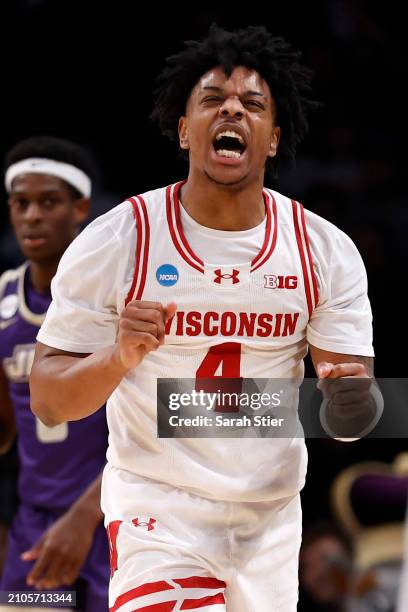 Kamari McGee of the Wisconsin Badgers reacts during the second half against the James Madison Dukes in the first round of the NCAA Men's Basketball...