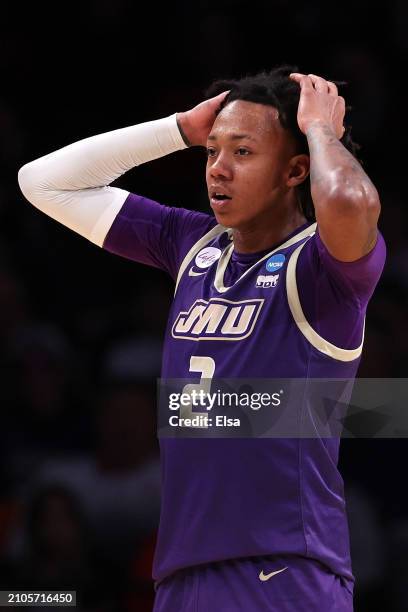 Raekwon Horton of the James Madison Dukes reacts after fouling out of the game during the second half against the Wisconsin Badgers in the first...