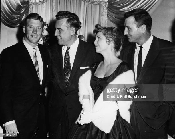 American baseball player Mickey Mantle, New Jersey governor Robert Meyner , American singer Julie London and her husband composer Bobby Troup greet...