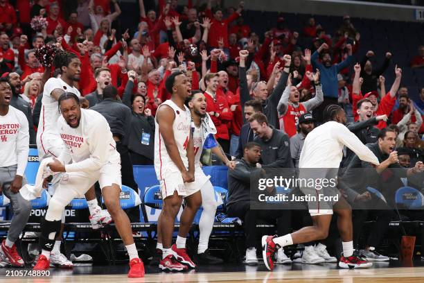 The Houston Cougars bench celebrates during the second half against the Longwood Lancers in the first round of the NCAA Men's Basketball Tournament...