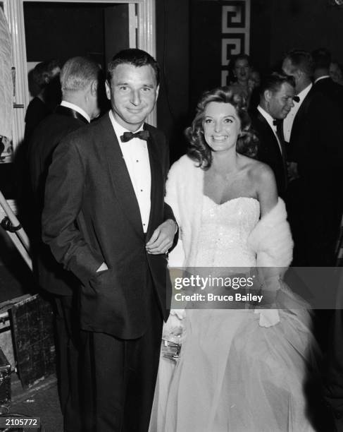 American composer and actor Bobby Troup and his wife, American singer Julie London , at the Waif Ball in the Crystal Room, CIRCA 1955.