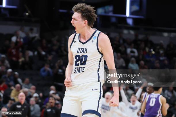 Isaac Johnson of the Utah State Aggies reacts after a shot against the TCU Horned Frogs during the second half in the first round of the NCAA Men's...