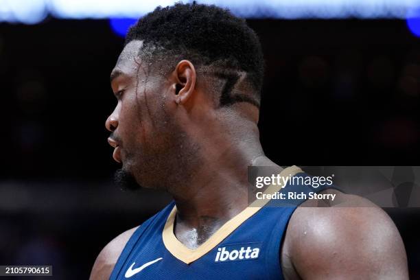 Zion Williamson of the New Orleans Pelicans looks on against the Miami Heat during the third quarter at Kaseya Center on March 22, 2024 in Miami,...