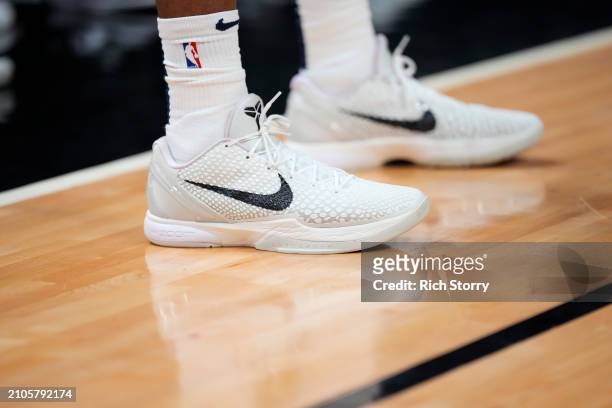 Detailed view of Herbert Jones of the New Orleans Pelicans sneakers during a game against /M at Kaseya Center on March 22, 2024 in Miami, Florida....