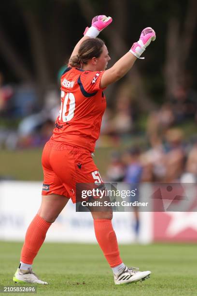 Courtney Newbon of the Victory celebrates the goal of Rachael Lowe of the Victory during the A-League Women round 21 match between Newcastle Jets and...