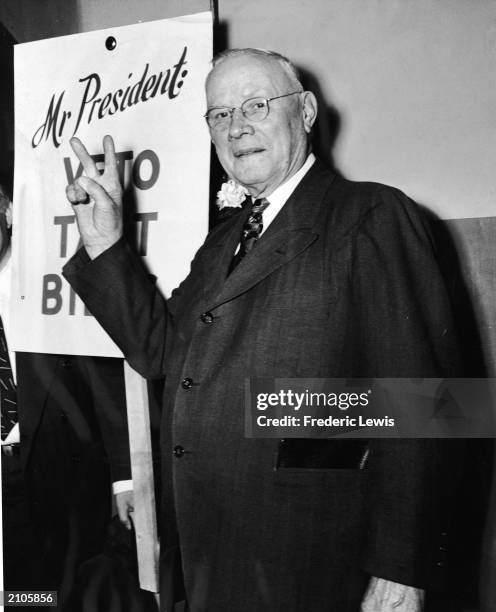 William Green , American labor leader; American Federation of Labor; on governing council, International Labor Organization , makes the v-sign, circa...