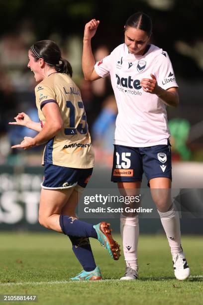 Lauren Allan of the Jets celebrates her goal as Emma Checker of the Victory reacts during the A-League Women round 21 match between Newcastle Jets...