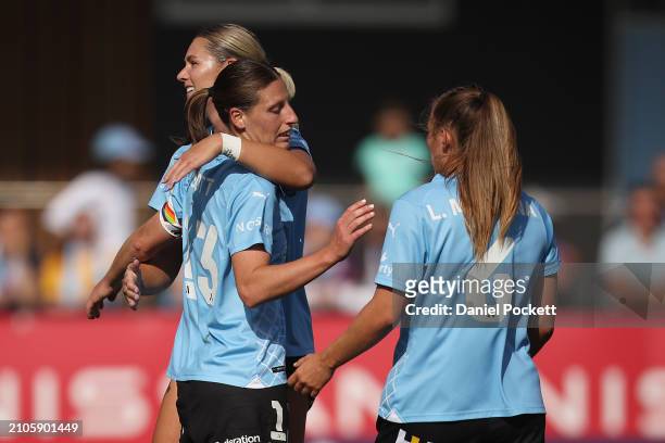 Rebekah Stott of Melbourne City celebrates with Taylor Otto of Melbourne City and Leticia McKenna of Melbourne City after a penalty was called during...