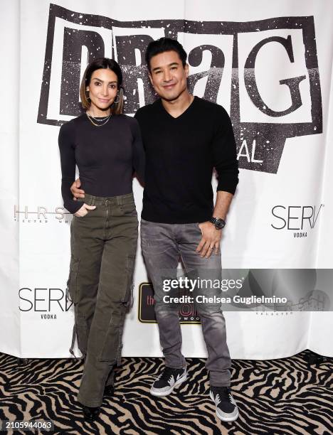 Courtney Mazza and Mario Lopez attend a "Drag: The Musical" Los Angeles performance at The Bourbon Room on March 22, 2024 in Hollywood, California.