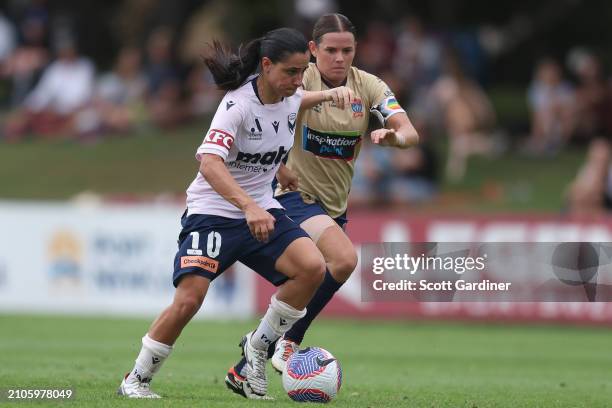 Alexandra Chidiac of the Victory competes for the ball with Cassidy Davis of the Jets during the A-League Women round 21 match between Newcastle Jets...