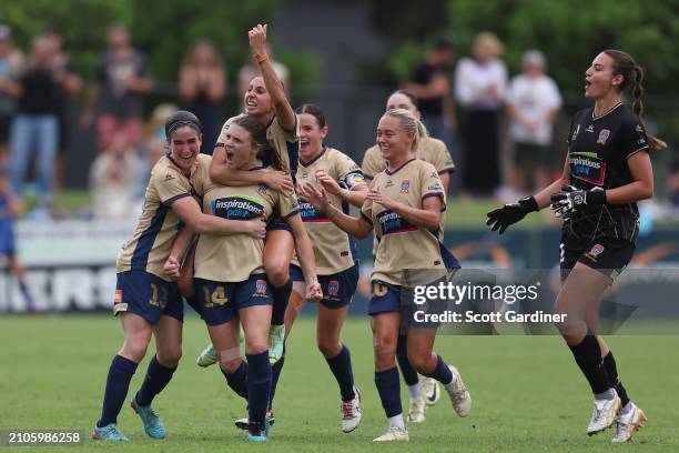 Melina Ayres of the Jets celebrates a goal with team mates during the A-League Women round 21 match between Newcastle Jets and Melbourne Victory at...