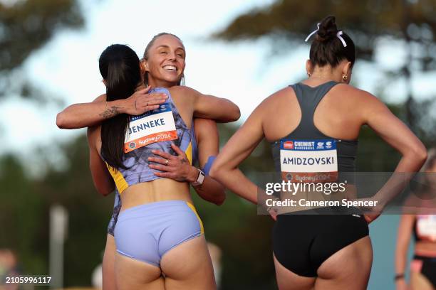 Liz Clay embraces Michelle Jenneke following the Womens 100m Hurdles final during the 2024 Sydney Track Classic at ES Marks Athletic Field on March...