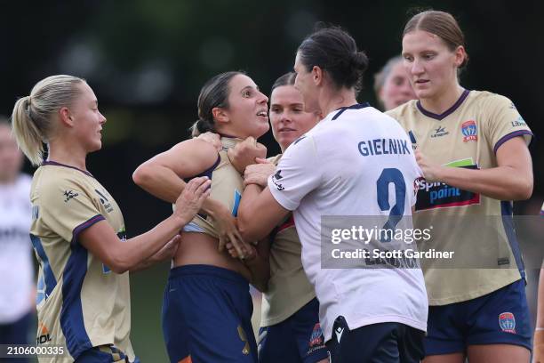 Melindaj Barbieri of the Jets tussles with Emily Gielnik of the Victory during the A-League Women round 21 match between Newcastle Jets and Melbourne...