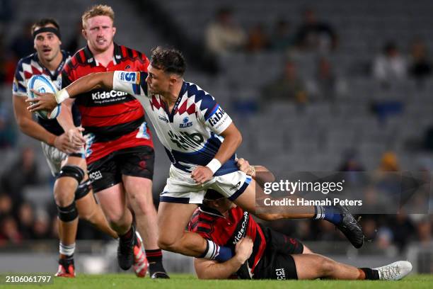 Cole Forbes of the Blues passes the ball during the round five Super Rugby Pacific match between Blues and Crusaders at Eden Park, on March 23 in...