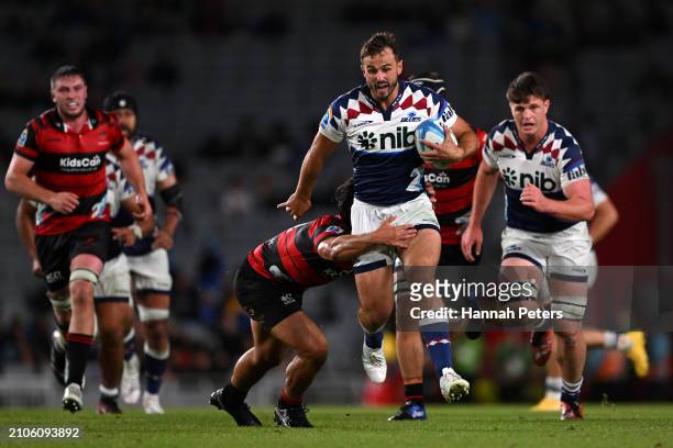 Harry Plummer of the Blues makes a break during the round five Super Rugby Pacific match between Blues and Crusaders at Eden Park, on March 23 in...