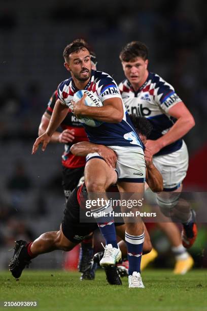 Harry Plummer of the Blues makes a break during the round five Super Rugby Pacific match between Blues and Crusaders at Eden Park, on March 23 in...