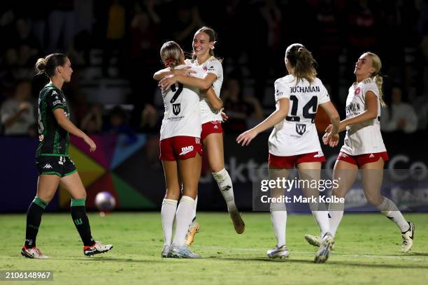 Sophie Harding of the Wanderers celebrates with her team mates after scoring a goal during the A-League Women round 21 match between Western Sydney...