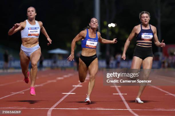 Bree Masters, Ebony Lane and Mia Gross compete in the Womens 100m final during the 2024 Sydney Track Classic at ES Marks Athletic Field on March 23,...