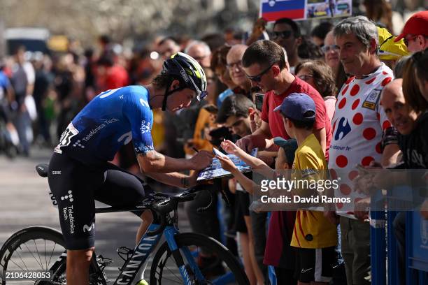 Ivan Garcia Cortina of Spain and Movistar Team signing autographs prior to the 103rd Volta Ciclista a Catalunya 2024, Stage 6 a 154.7km stage from...