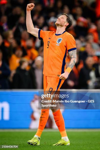 Wout Weghorst of the Netherlands celebrates his team's third goal during the friendly match between Netherlands and Scotland at Johan Cruyff Arena on...