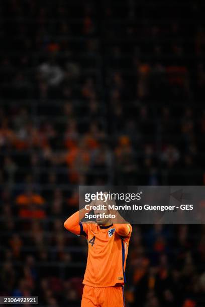Virgil van Dijk of the Netherlands looks on during the friendly match between Netherlands and Scotland at Johan Cruyff Arena on March 22, 2024 in...