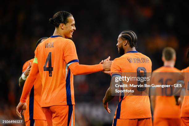 Georginio Wijnaldum of the Netherlands celebrates with Virgil van Dijk his team's second goal during the friendly match between Netherlands and...