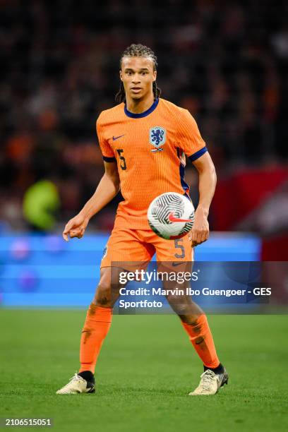 Nathan Ake of the Netherlands controls the ball during the friendly match between Netherlands and Scotland at Johan Cruyff Arena on March 22, 2024 in...