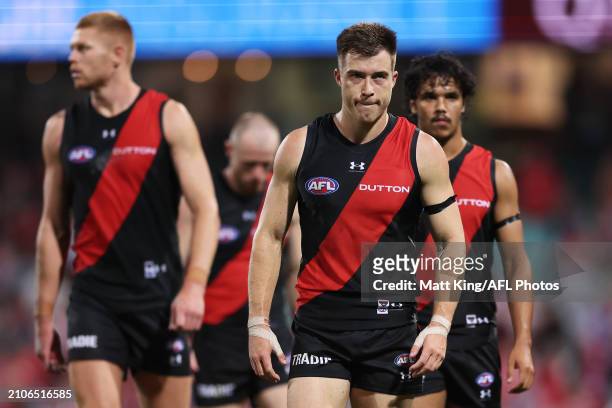 Zach Merrett of the Bombers and team mates look dejected after the round two AFL match between Sydney Swans and Essendon Bombers at SCG, on March 23...