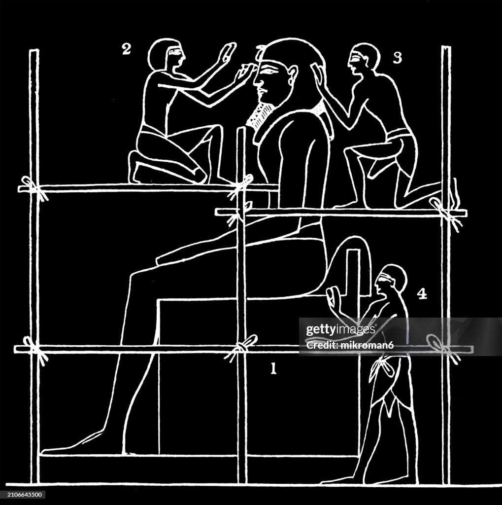 Old engraved illustration of Egyptian sculptors at work