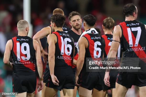 Bombers players walk from the field after defeat during the round two AFL match between Sydney Swans and Essendon Bombers at SCG, on March 23 in...