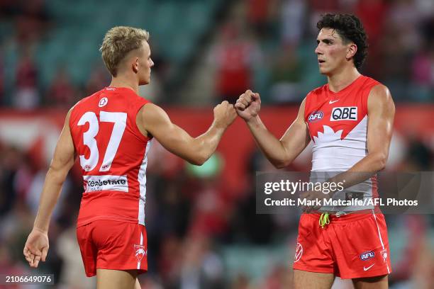 Sam Wicks and Corey Warner of the Swans celebrate after victory during the round two AFL match between Sydney Swans and Essendon Bombers at SCG, on...