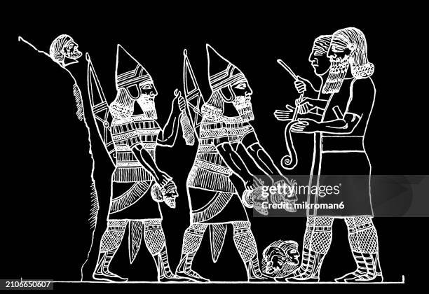old engraved illustration of relief depicting neo-assyrian scribes recording the number of enemies slain by soldiers - civilisation ancienne photos et images de collection